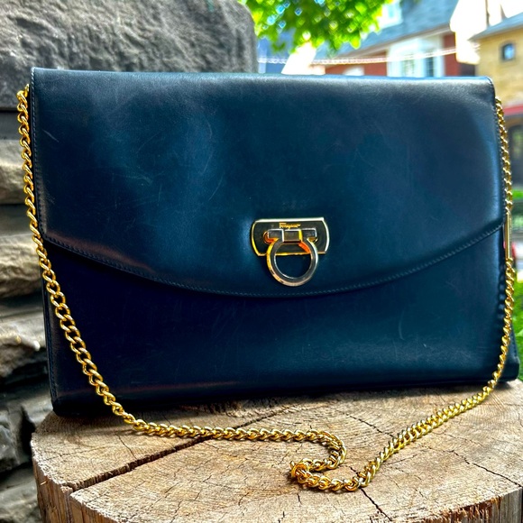 Salvatore Ferragamo Handbags - Vintage Salvatore FERRAGAMO navy blue leather crossbody clutch gold chain strap.